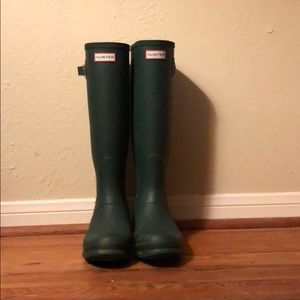 Dark green Hunter tall rain boots